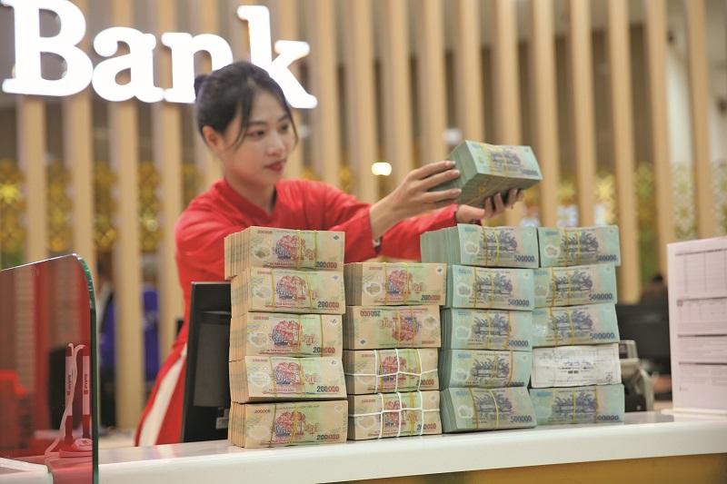 Chính sách tiền tệ thêm nới lỏng, áp lực với tỷ giá càng tăng